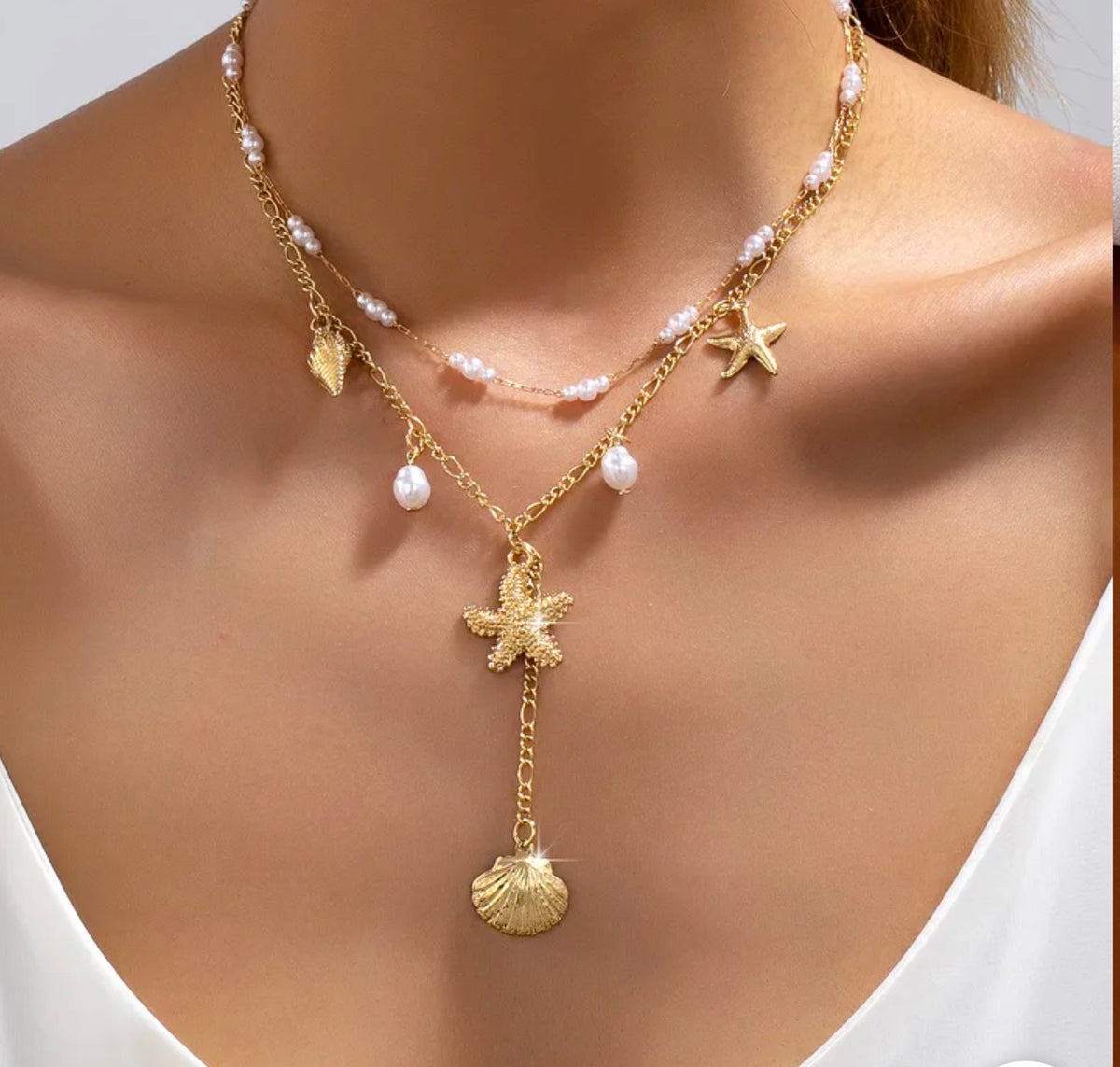 COLLIER PAULA